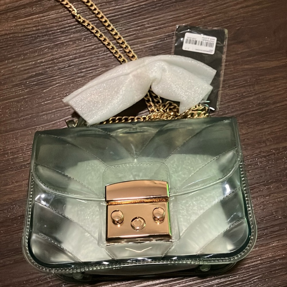 Crossi new york crossbody.  Clear green.  New with tags